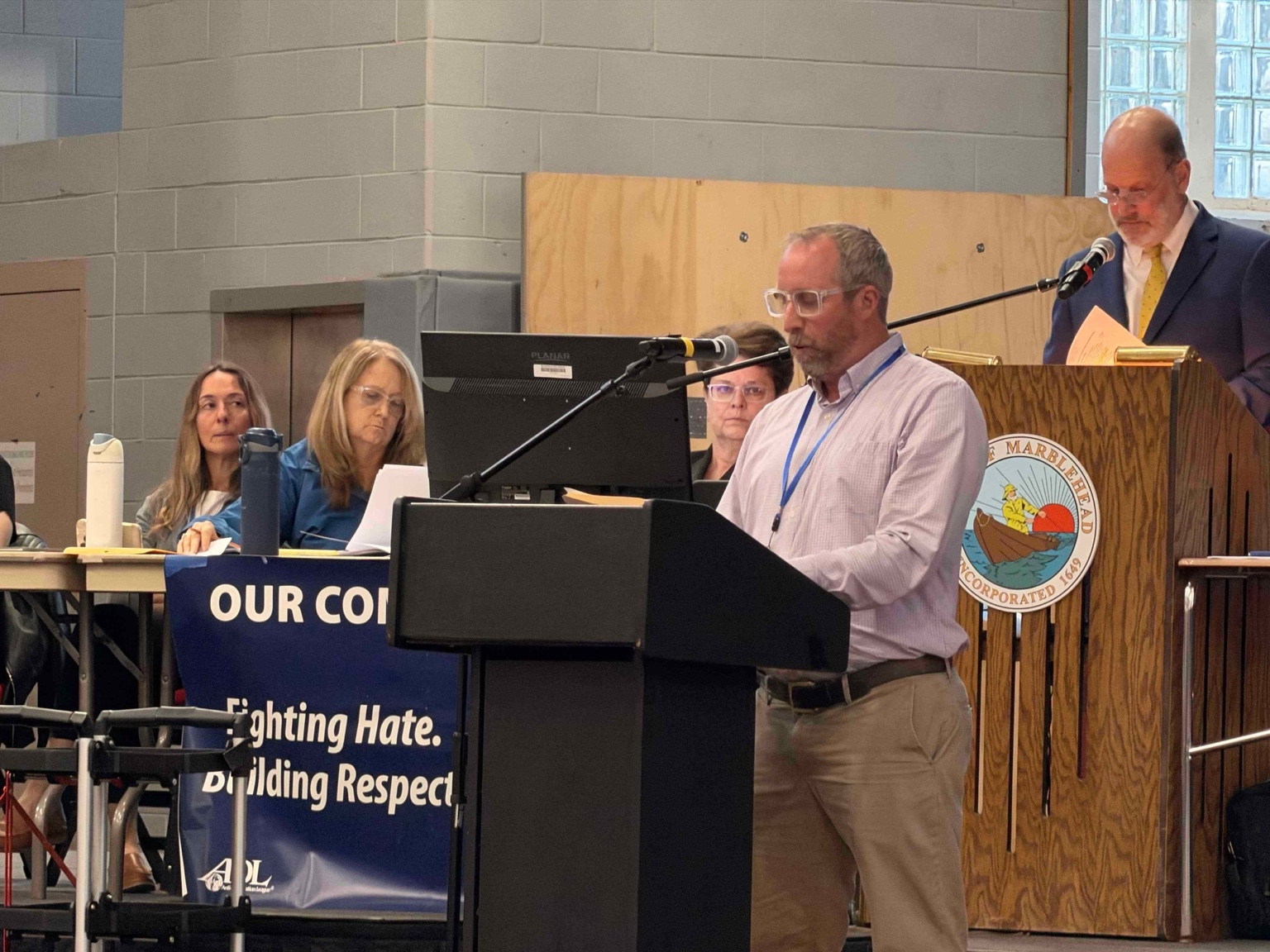 Marblehead Public Health Director Andrew Petty at the lectern.