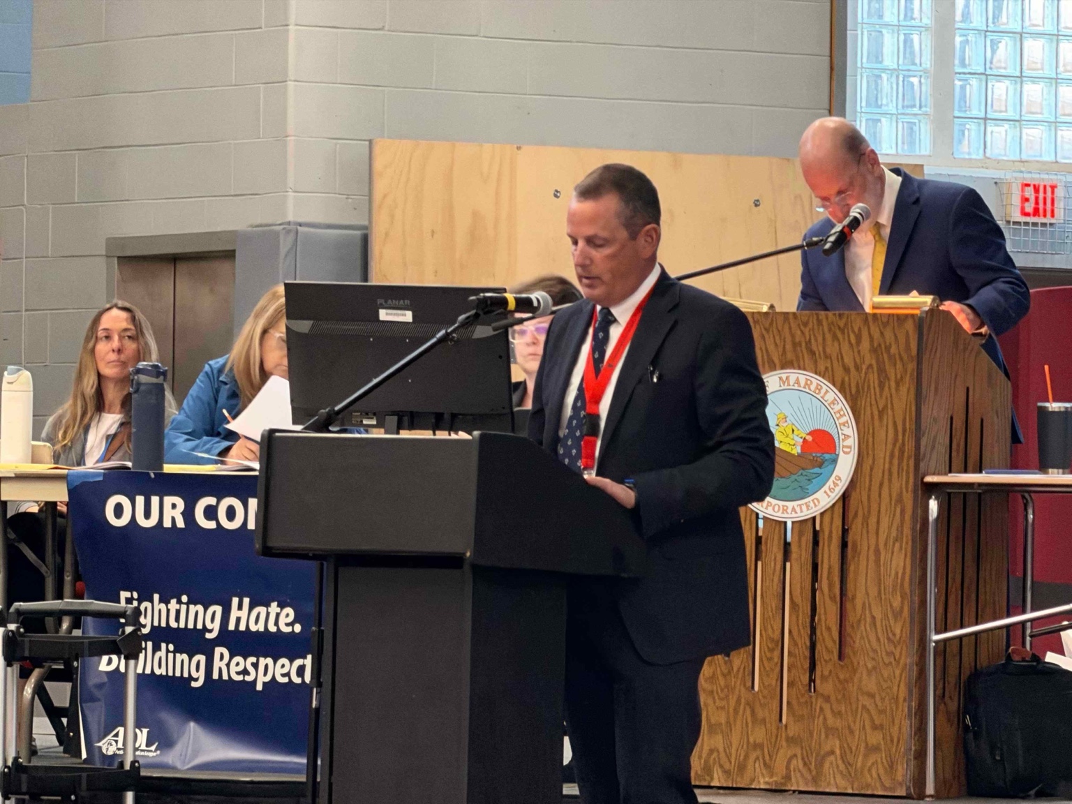 Michael Pifferling, assistant superintendent for finance and operations of the Marblehead Public Schools, at the lectern.