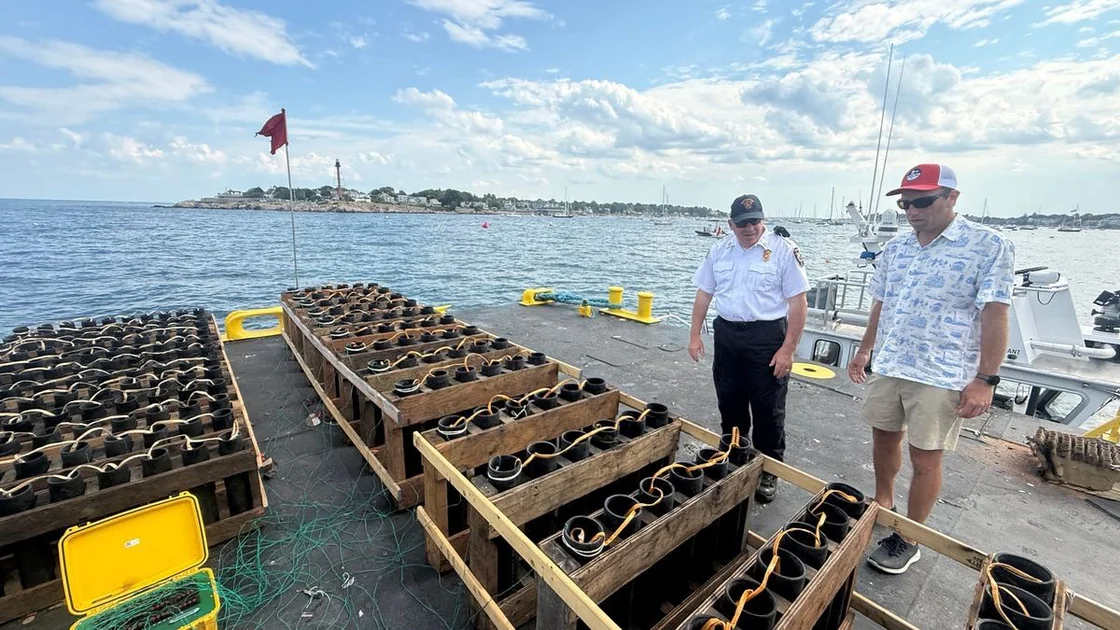 07-fire-officials-inspect-barge-to-clear-harbor-fireworks-for-launch